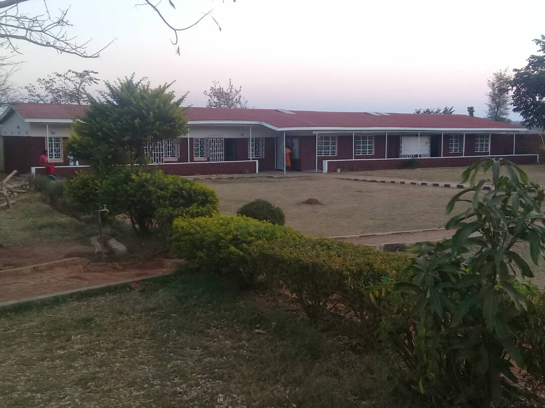The Rayyan Academy campus building and grounds in Likuni